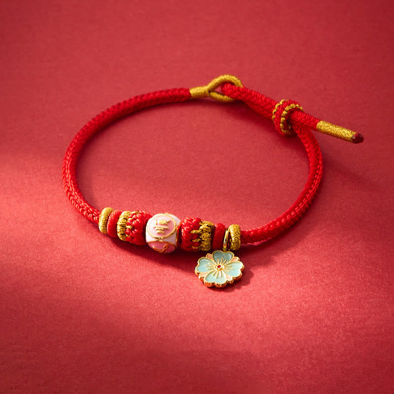 ATELIER-TIBET – Bracelet de Protection Fleur de Pêcher en Cuivre Plaqué Or & Fil Rouge