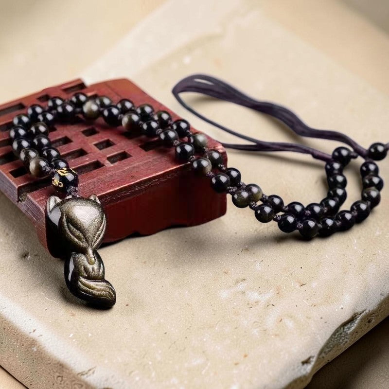 ATELIER-TIBET – Pendentif Renard Sage en Obsidienne Dorée
