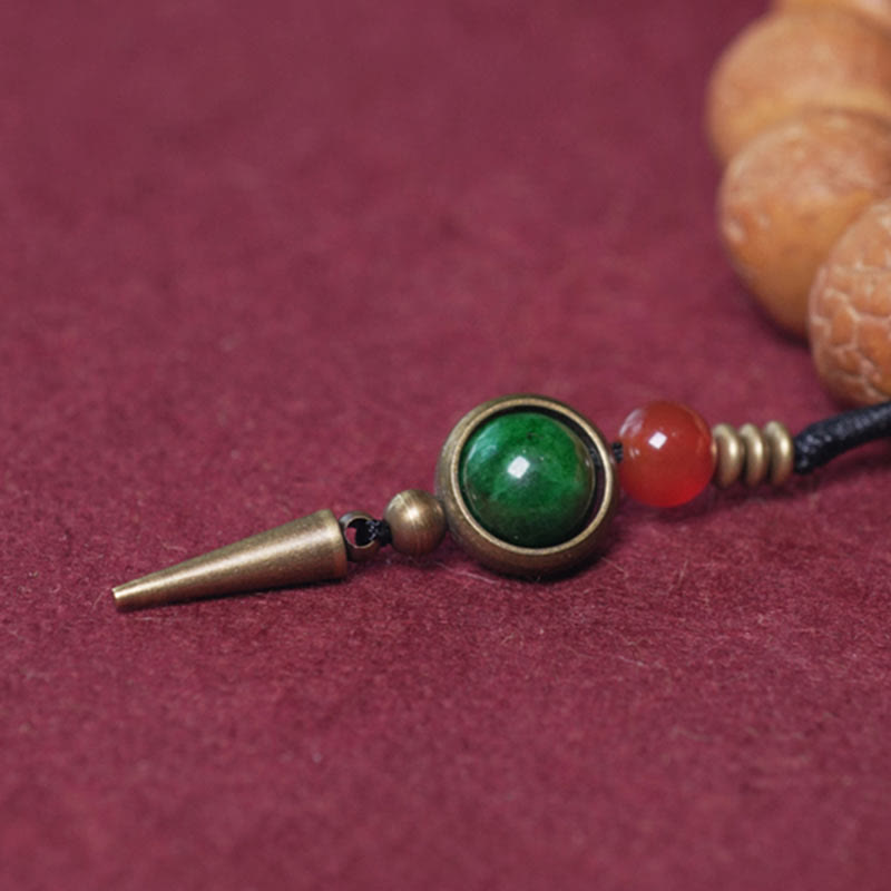 ATELIER-TIBET Bracelet Mala Bodhi 14 mm et Perles Dzi Artisanales La force symbolique des graines sacrées
