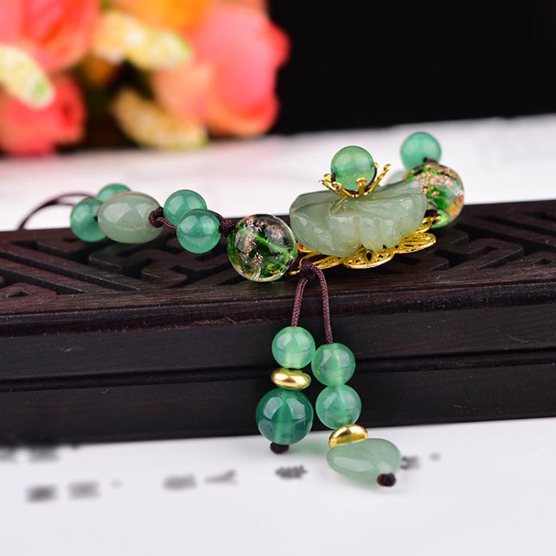 ATELIER-TIBET – Bracelet Porte-Bonheur en Jade Vert & Fleur Symbolique | Harmonie & Épanouissement