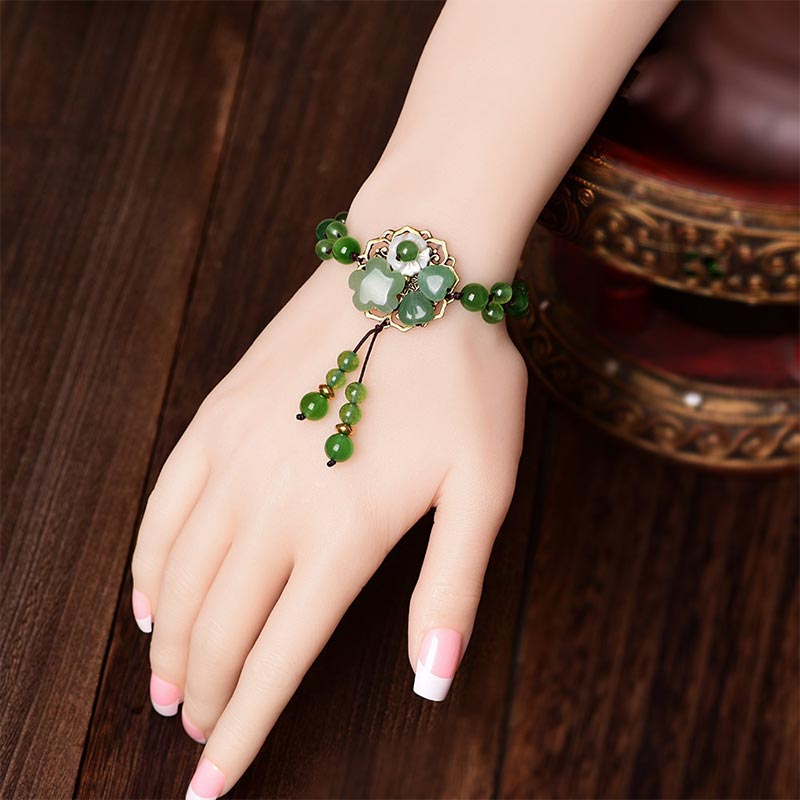 ATELIER-TIBET – Bracelet Porte-Bonheur en Jade Vert & Fleur Symbolique | Harmonie & Épanouissement