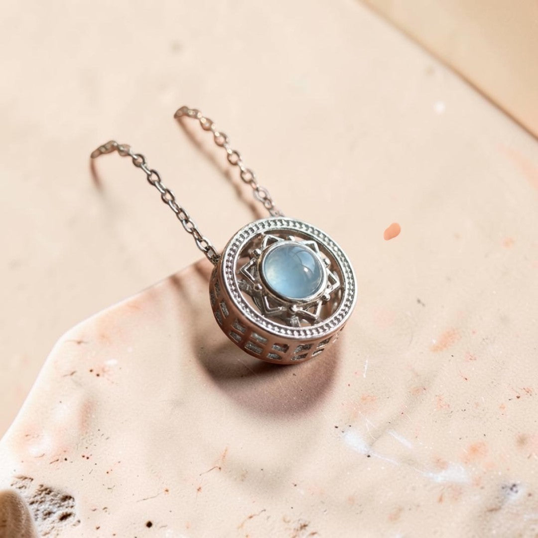 ATELIER-TIBET – Pendentif Rotatif Emotions apaisées en Aigue-Marine