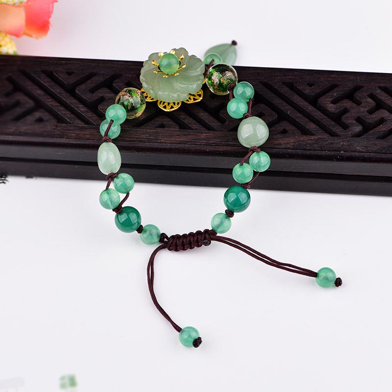 ATELIER-TIBET – Bracelet Porte-Bonheur en Jade Vert & Fleur Symbolique | Harmonie & Épanouissement