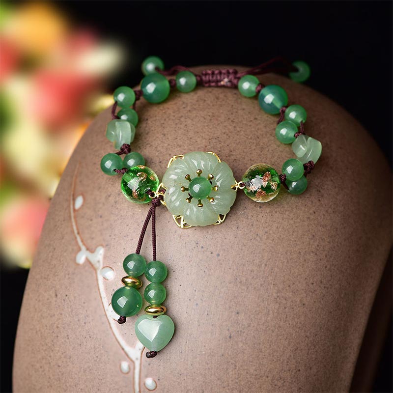 ATELIER-TIBET – Bracelet Porte-Bonheur en Jade Vert & Fleur Symbolique | Harmonie & Épanouissement