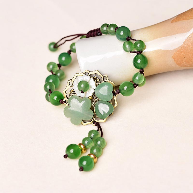 ATELIER-TIBET – Bracelet Porte-Bonheur en Jade Vert & Fleur Symbolique | Harmonie & Épanouissement