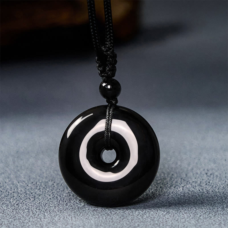 ATELIER-TIBET – Pendentif Boucle de Paix en Obsidienne Noire Naturelle