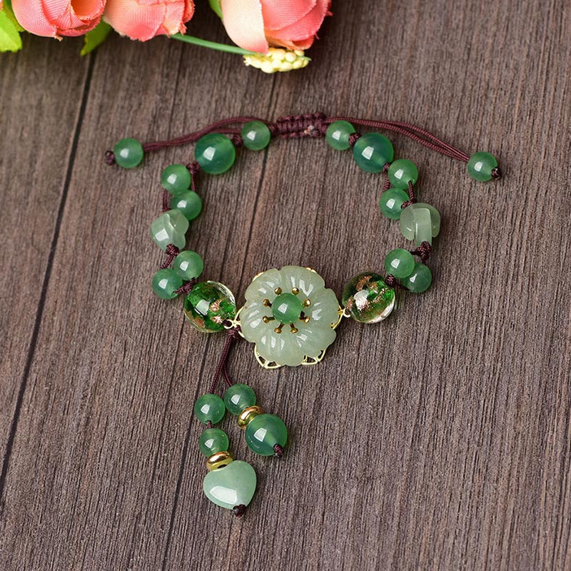 ATELIER-TIBET – Bracelet Porte-Bonheur en Jade Vert & Fleur Symbolique | Harmonie & Épanouissement