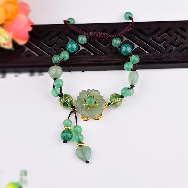 ATELIER-TIBET – Bracelet Porte-Bonheur en Jade Vert & Fleur Symbolique | Harmonie & Épanouissement