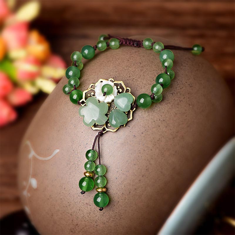 ATELIER-TIBET – Bracelet Porte-Bonheur en Jade Vert & Fleur Symbolique | Harmonie & Épanouissement